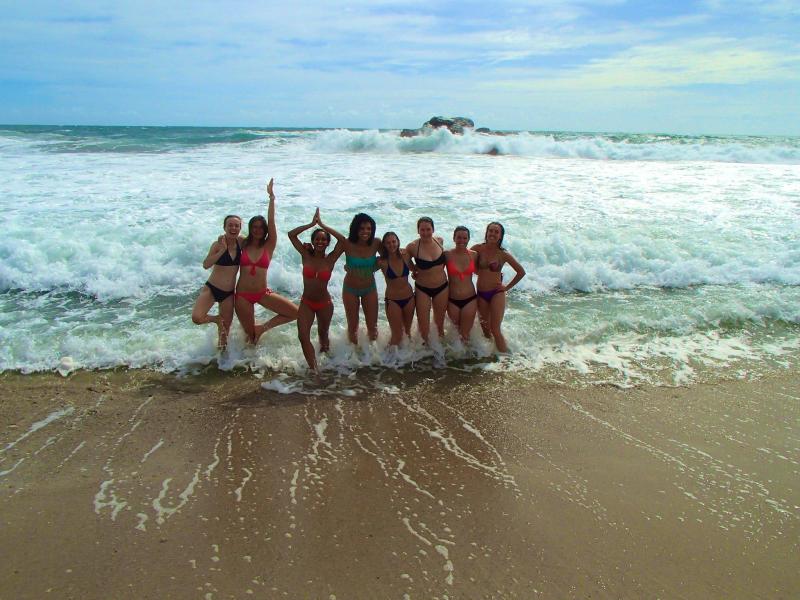 The girls on the beach--some of us did yoga poses, but not all!